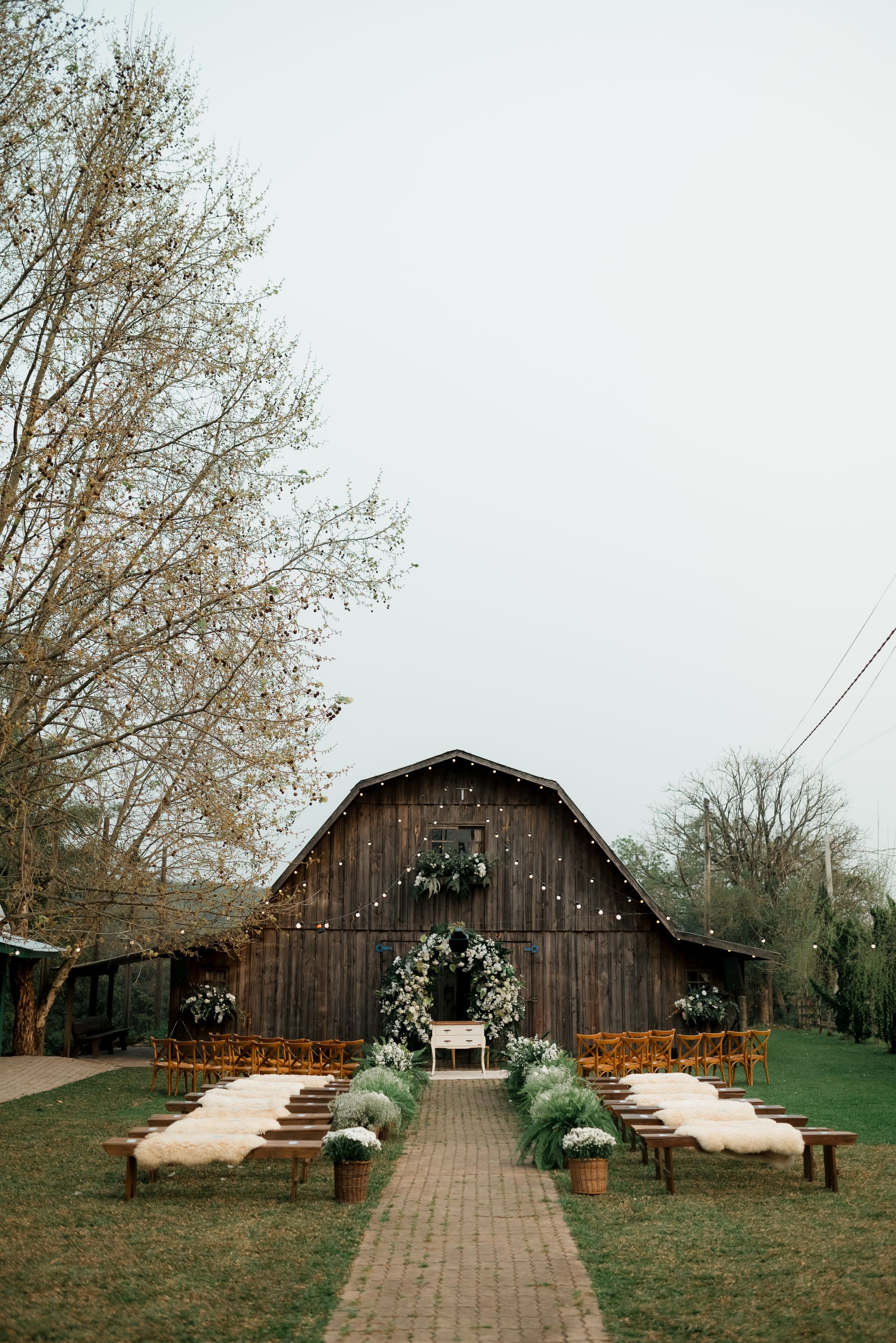 Generic placeholder photograph of a rustic barn venue exterior